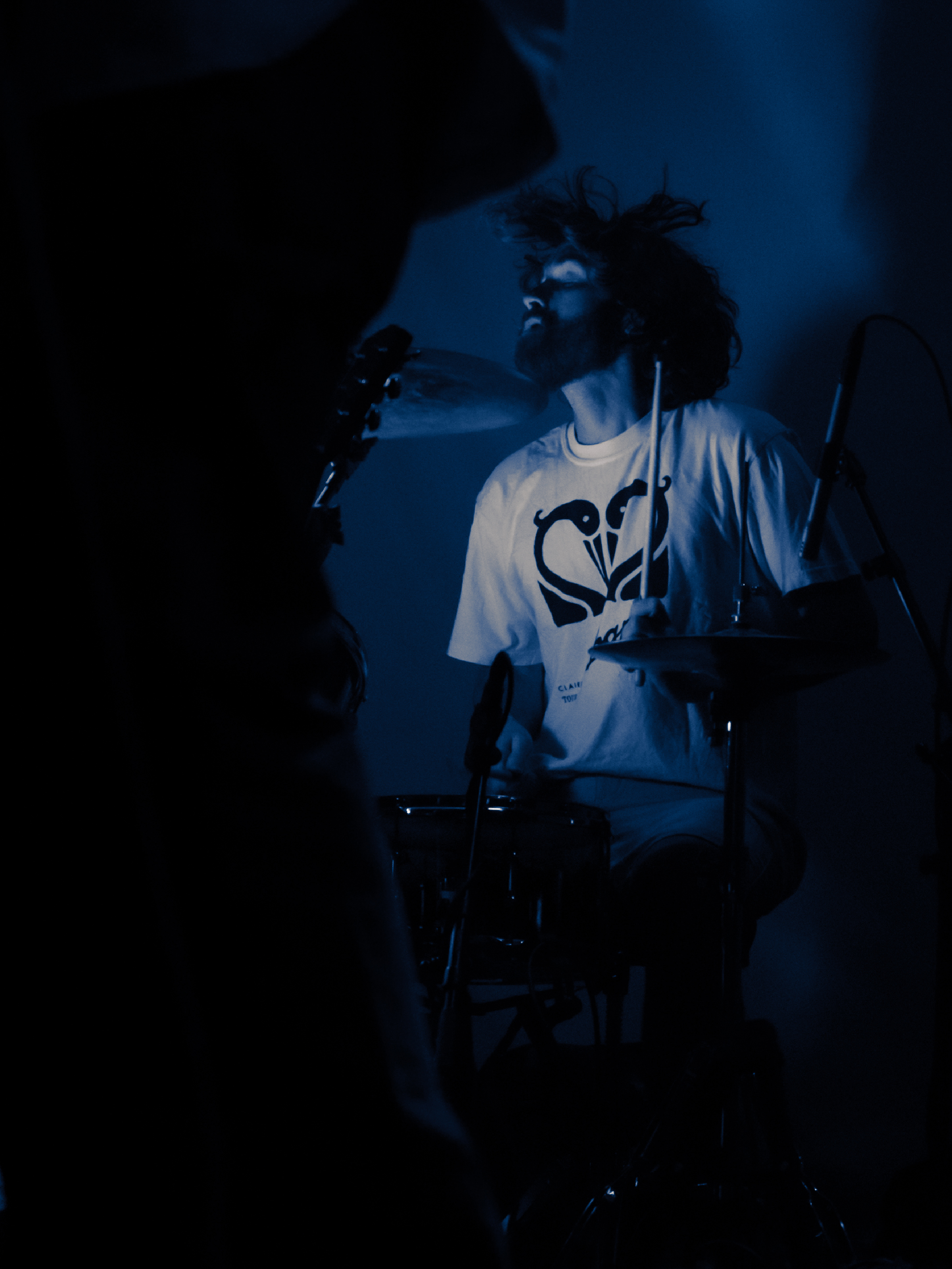 Nara's drummer, Brendan, captured in rapid motion.