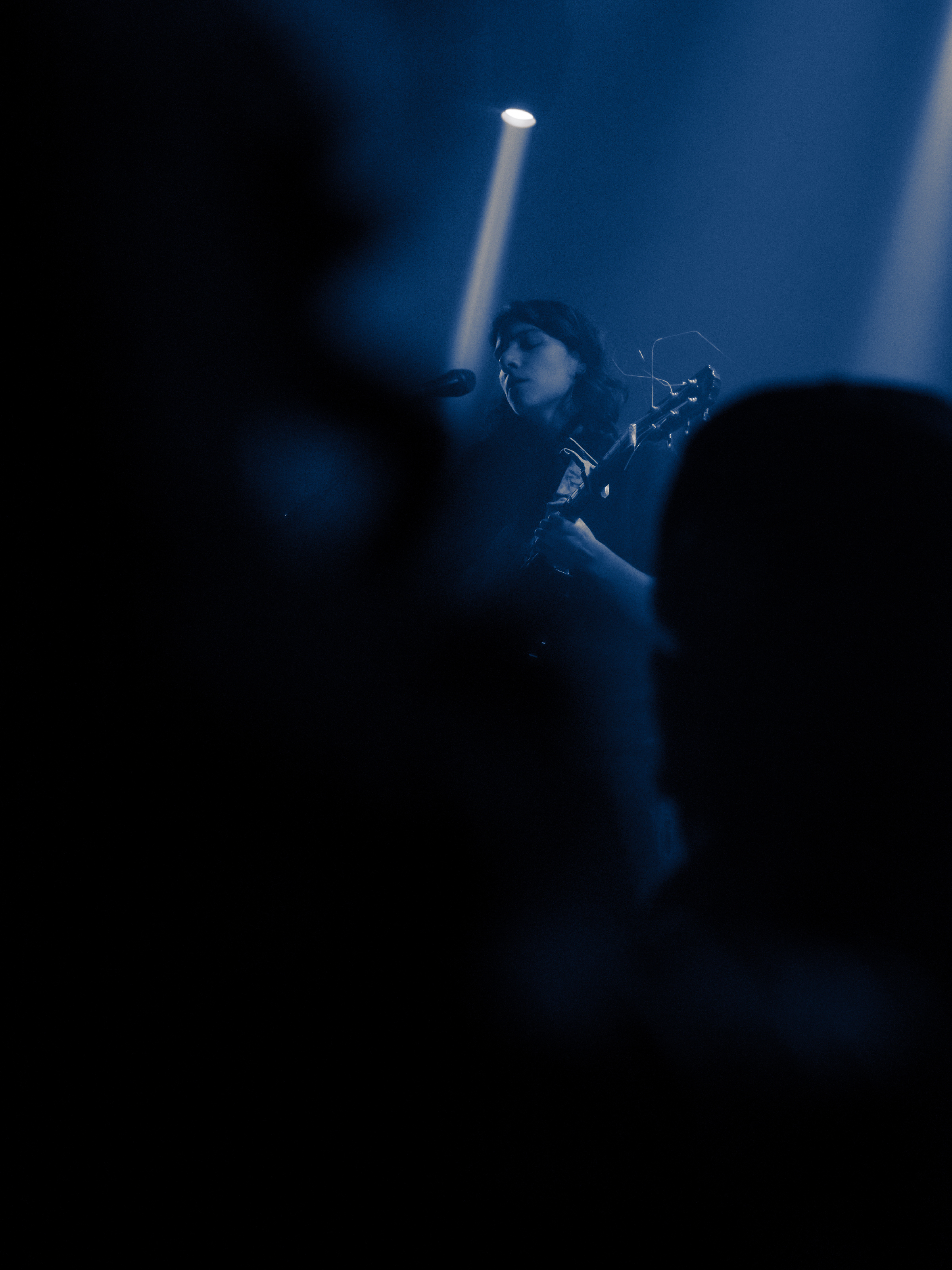 Nara framed by the audience.