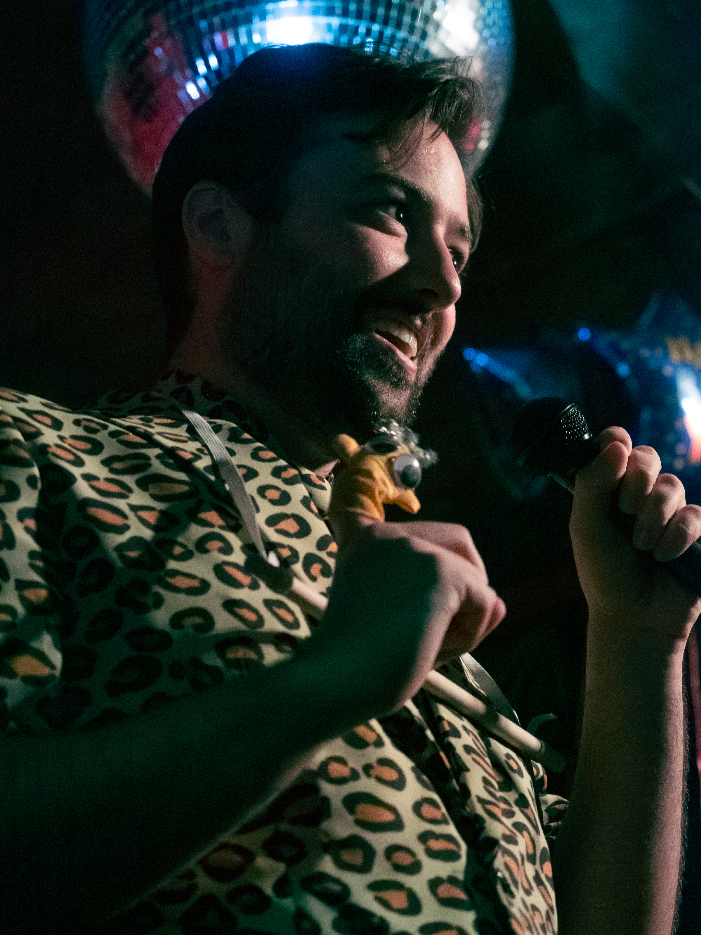 Madoc Smith brought a second prop! He reveals a small puppet.