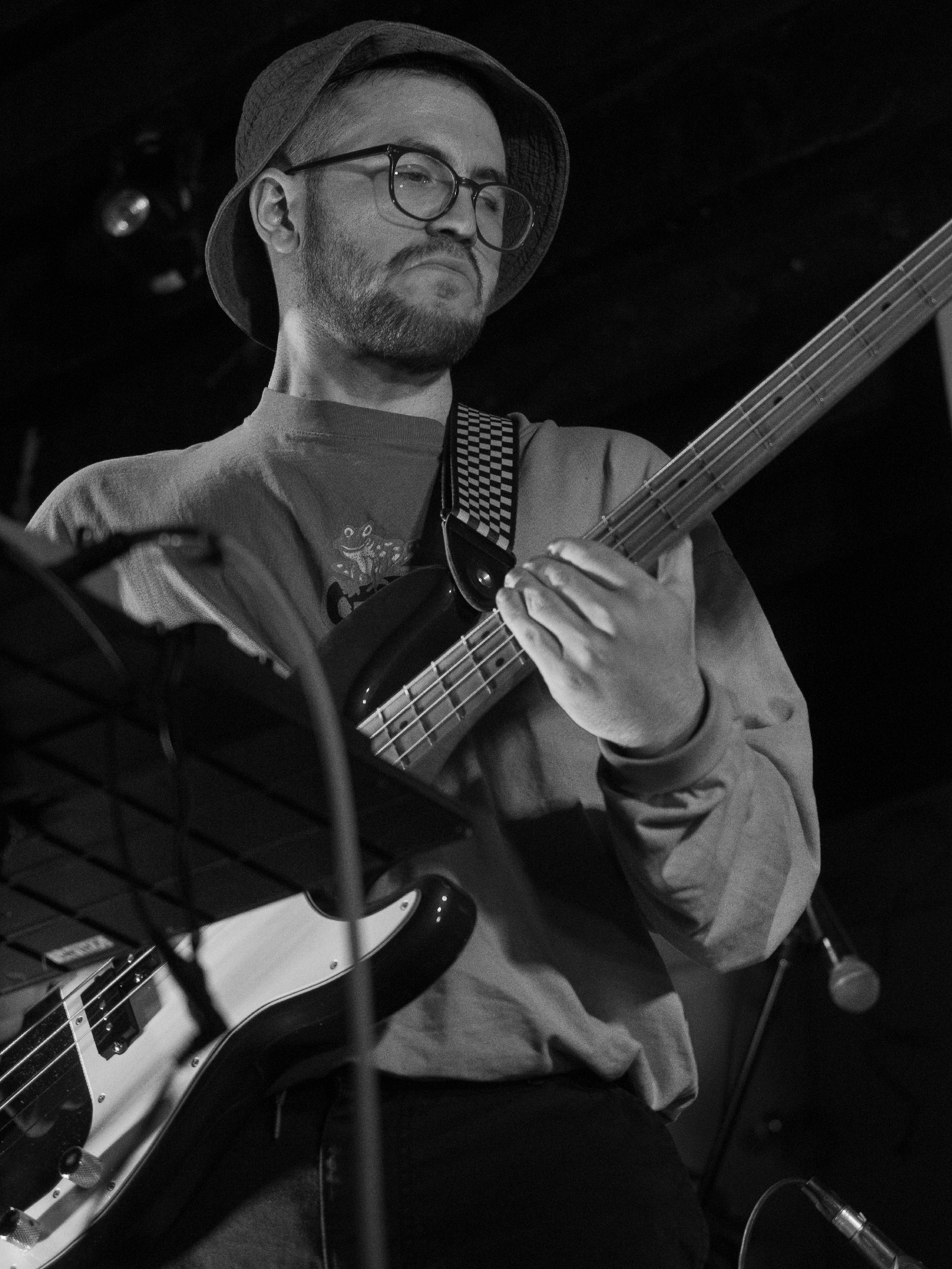 Portrait of Will playing Bass.