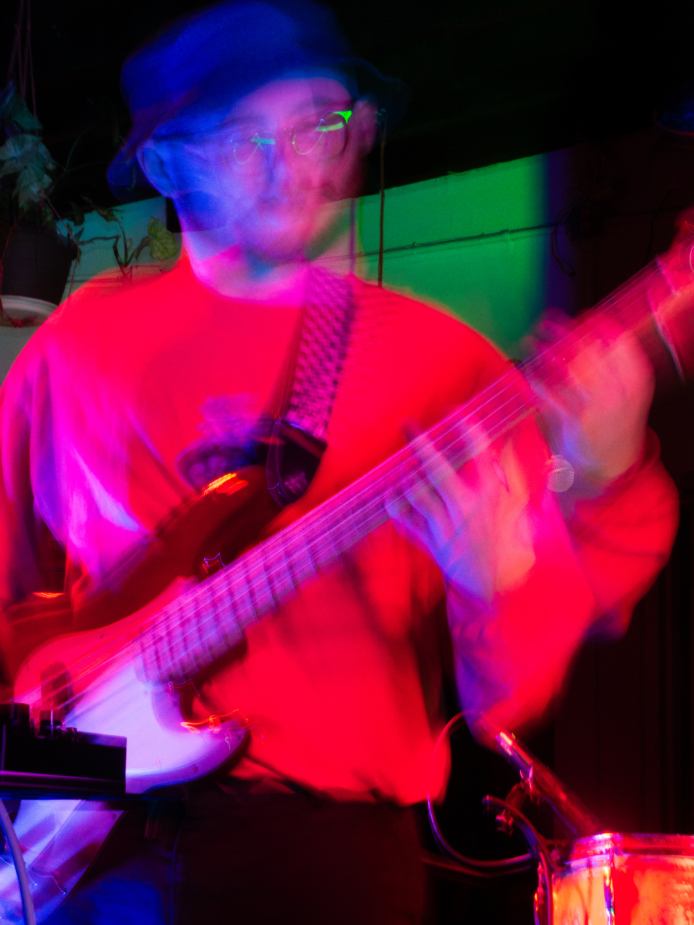 Long exposure of Will playing Bass.