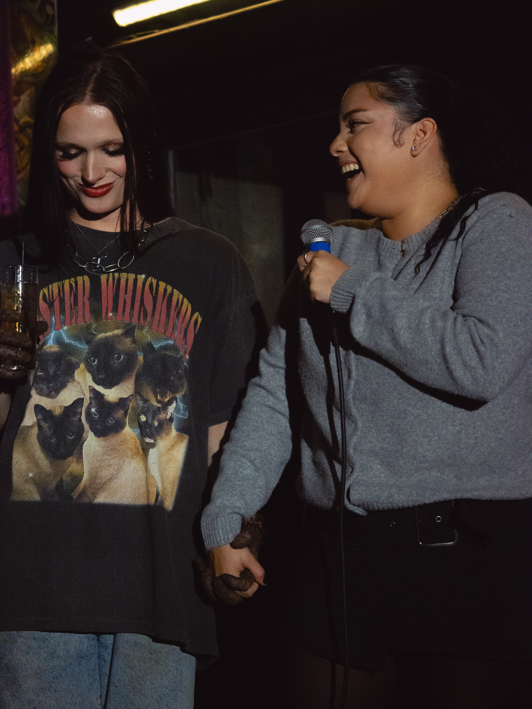 Michelladonna and Tina Hand are hand in hand.