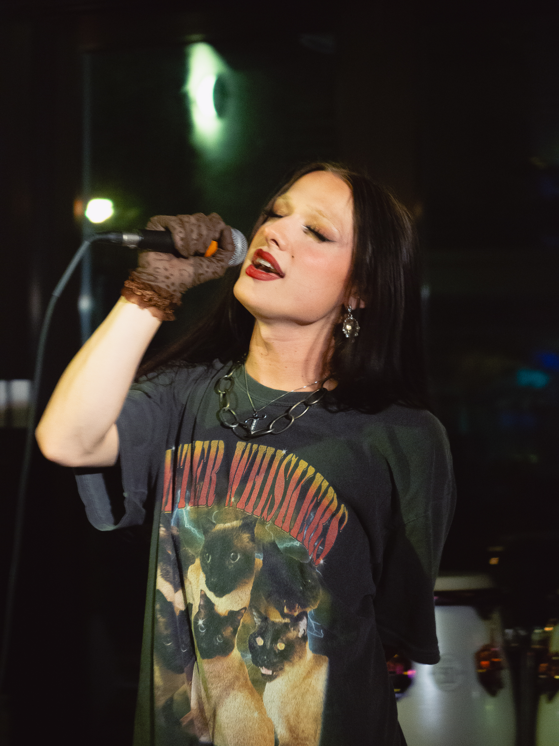 Tina Hand sings a number.