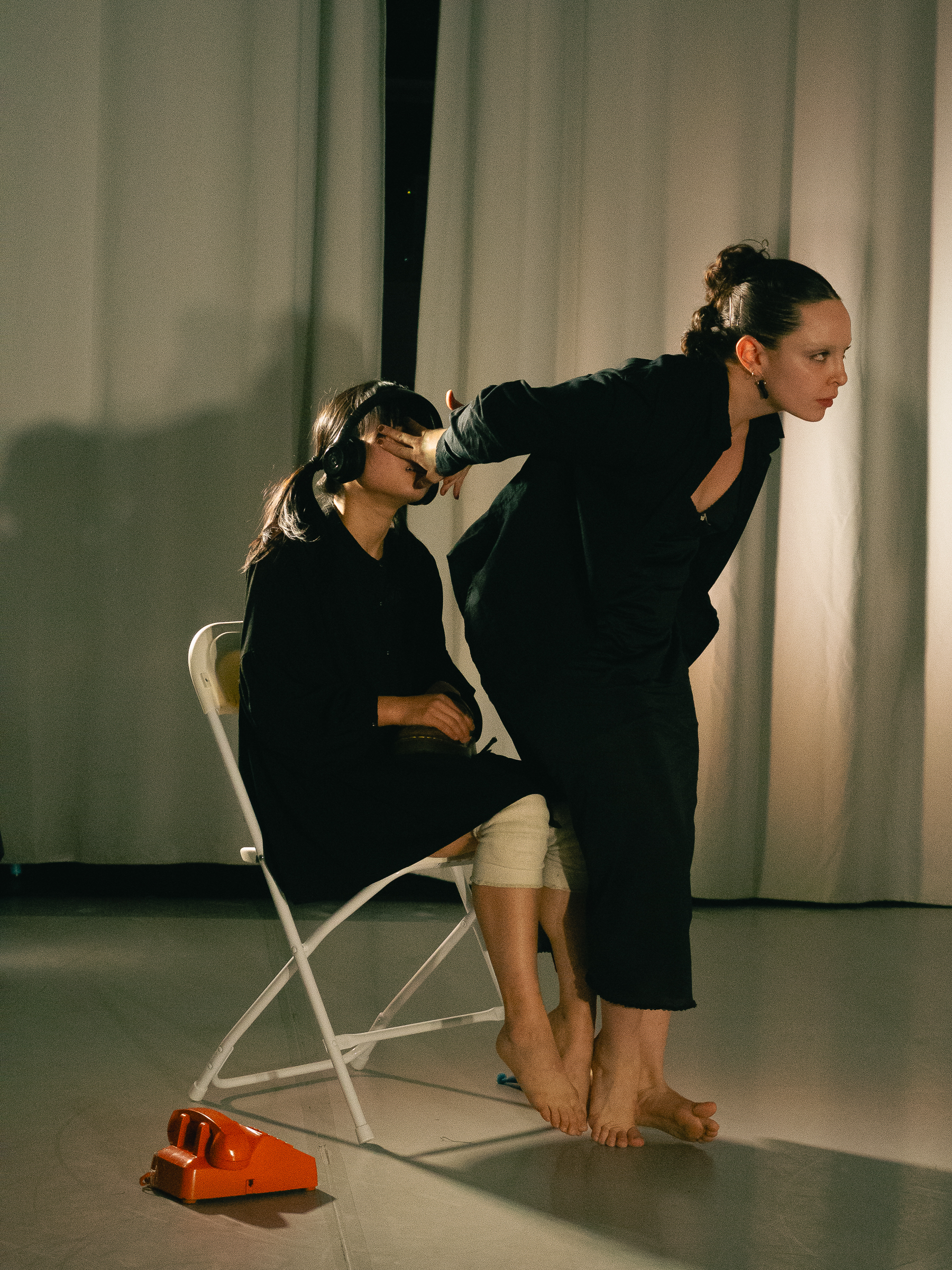 Photo of dancers performing A Dreamt up Draft of Suggestion.