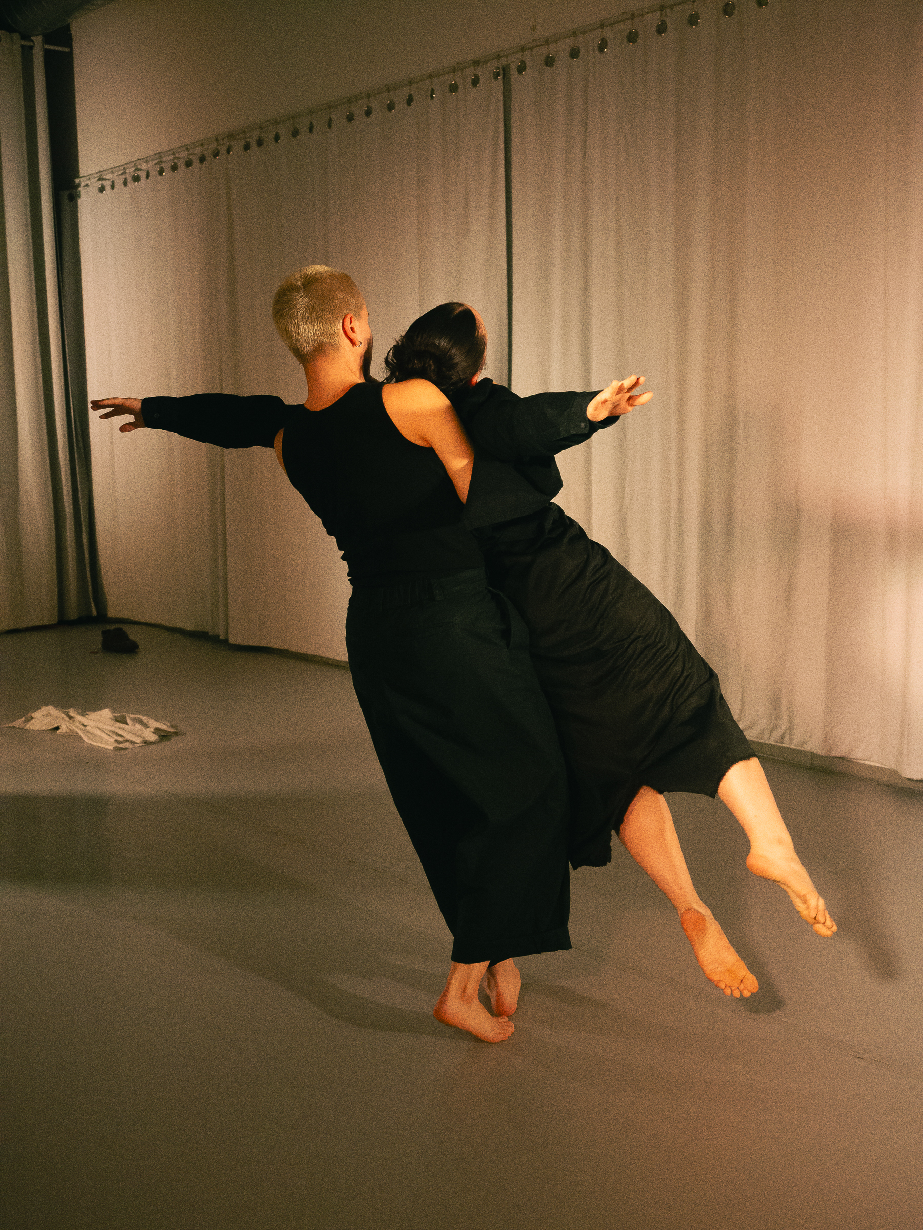 Photo of dancers performing A Dreamt up Draft of Suggestion.