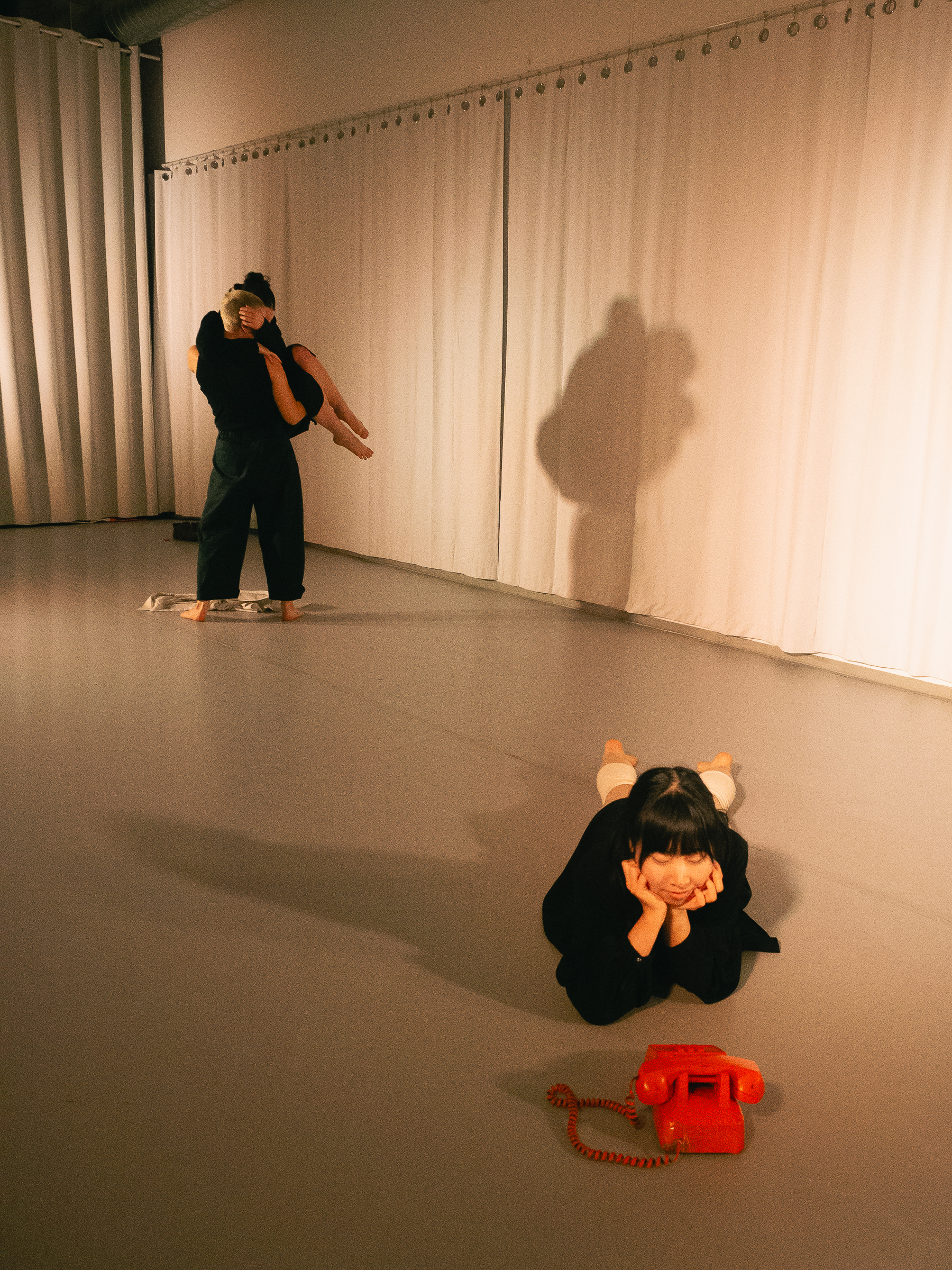 Photo of dancers performing A Dreamt up Draft of Suggestion.