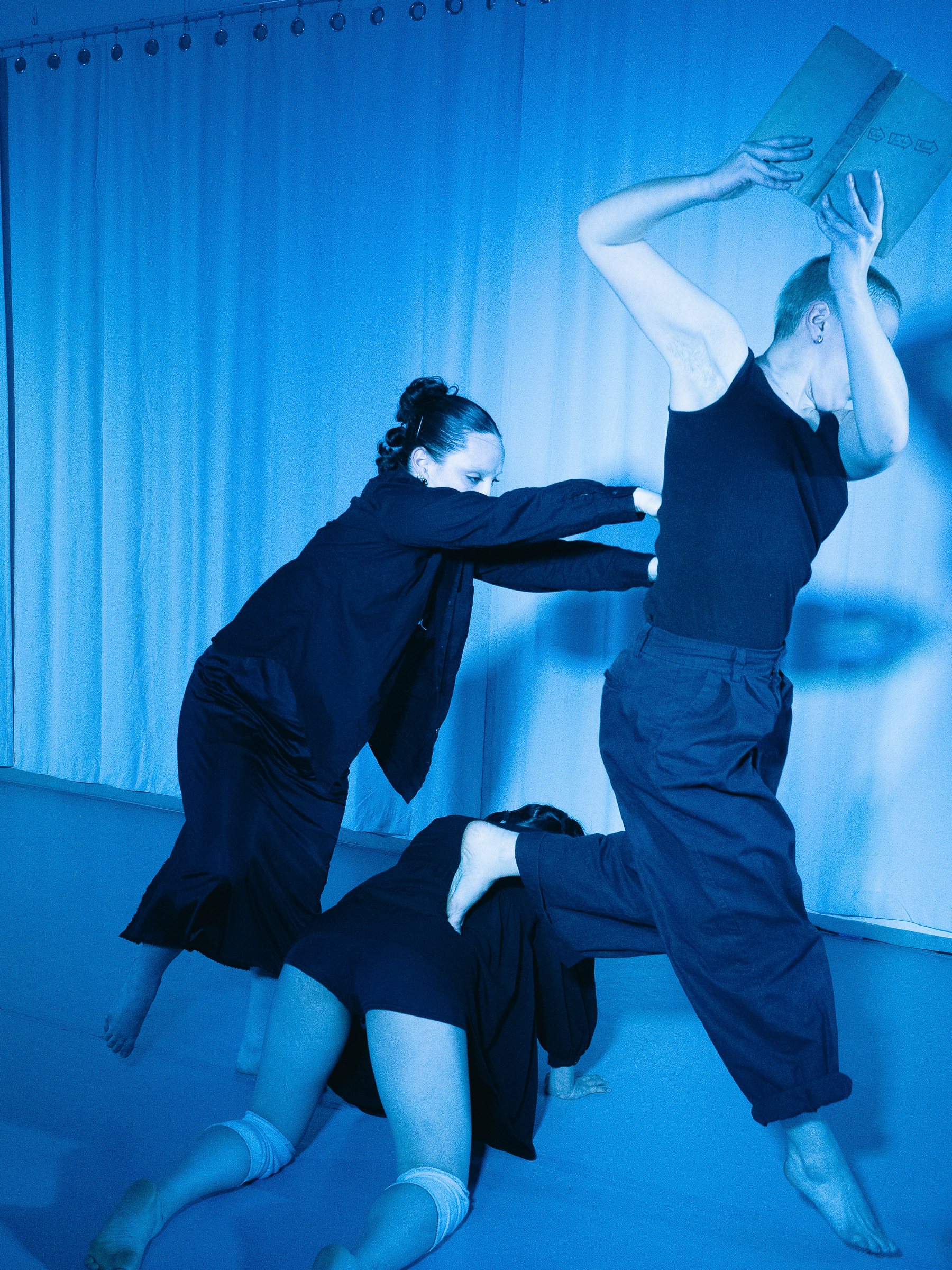 Photo of dancers performing A Dreamt up Draft of Suggestion.