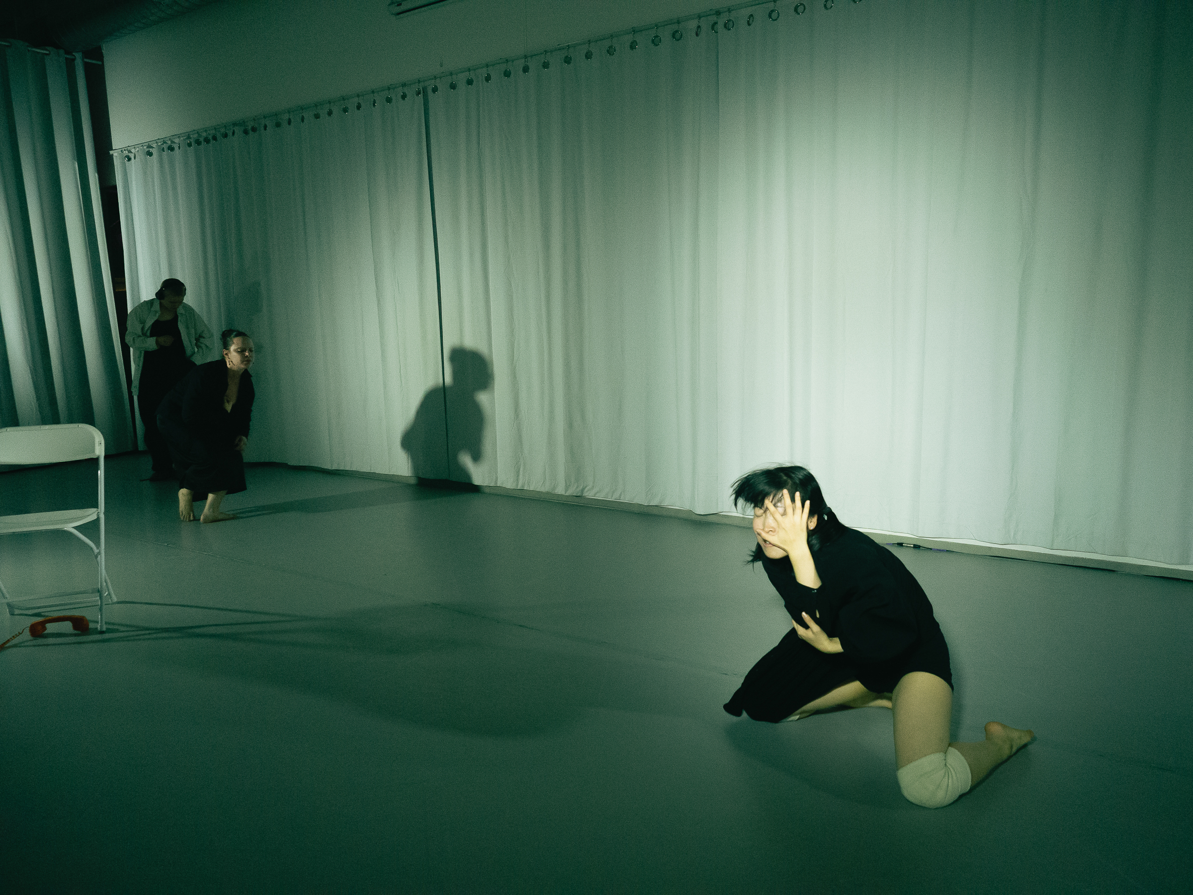 Photo of dancers performing A Dreamt up Draft of Suggestion.